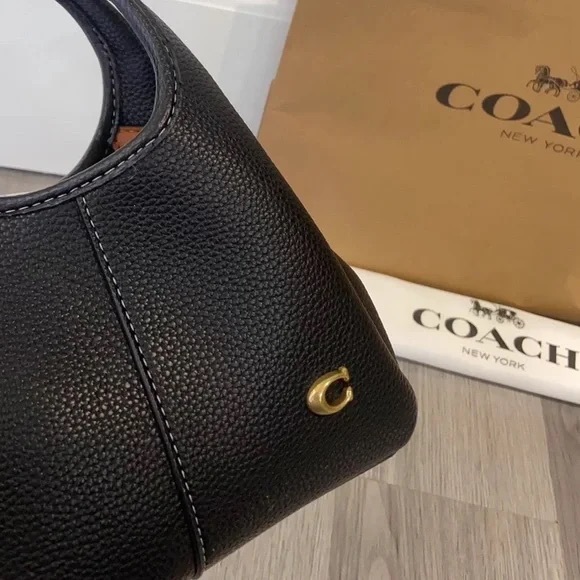 NWT Coach Lana 19